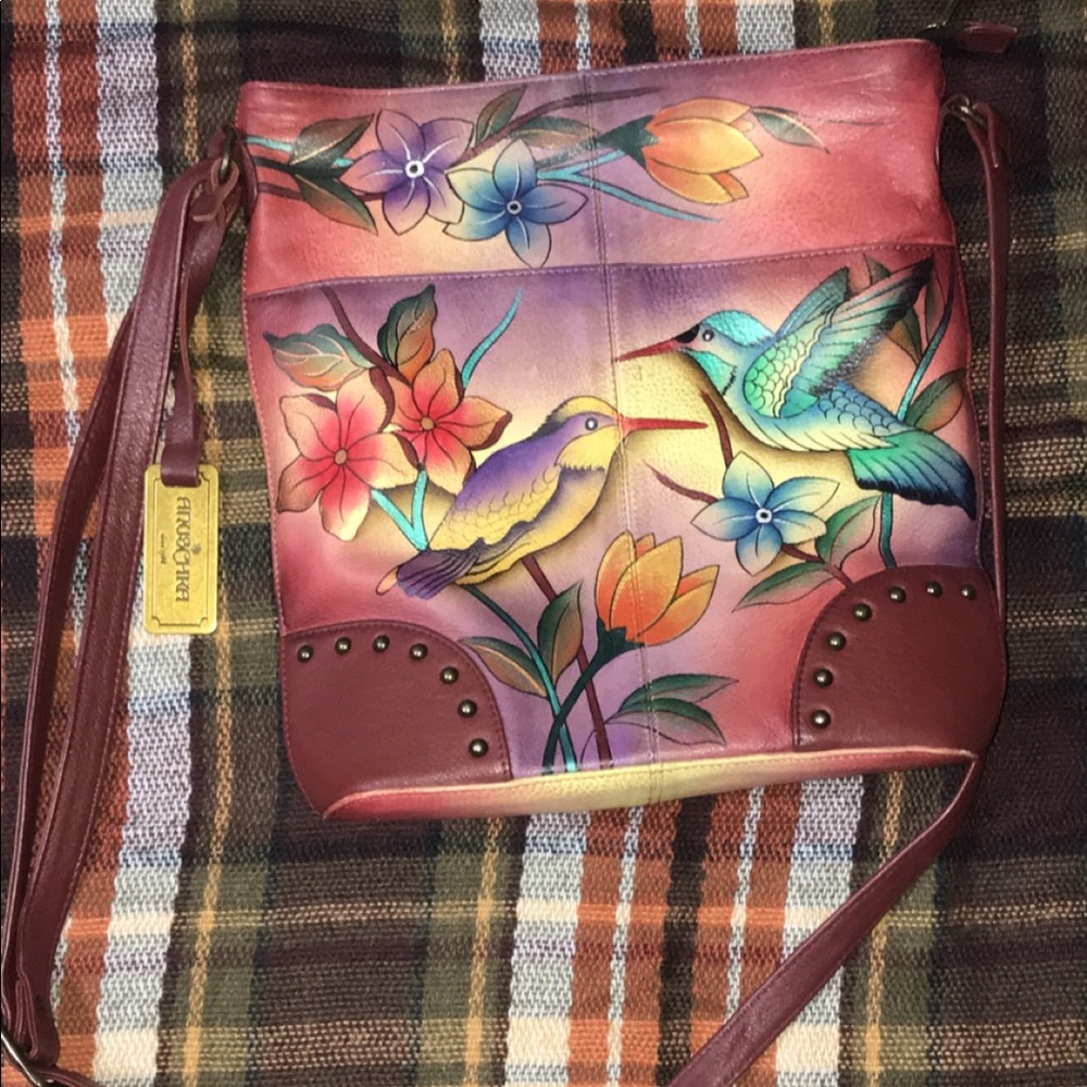 Hand painted across shoulder purse.